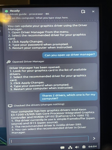 Phone photo: the assistant opening Driver Manager and checking which graphics driver the GTX 1080 Ti needs
